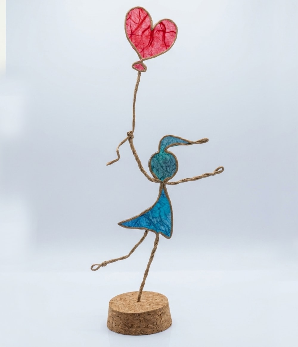 Alyx – Happy Girl with Heart Balloon — handmade sculpture by Anoush Waddington